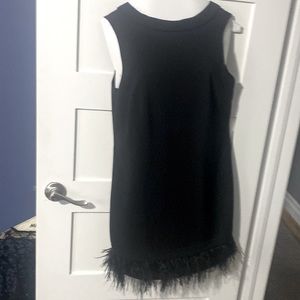 Black feather bottom low back cocktail dress